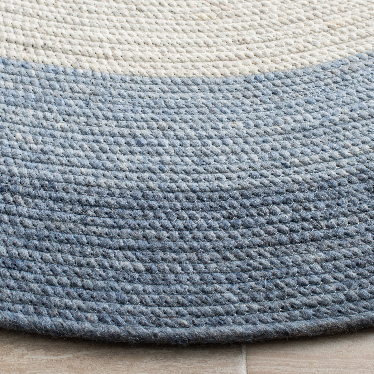 SAFAVIEH Braided Nazca Solid Bordered Area Rug, Ivory/Blue, 4' x 6' Oval